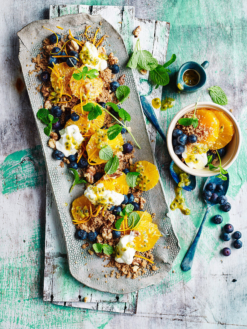 Spiced couscous with, oranges, blueberries and passionfruit yoghurt