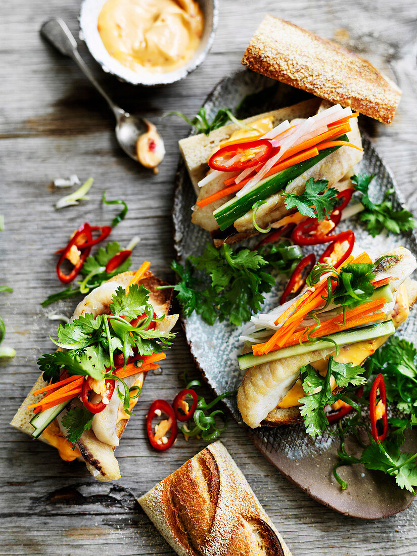 Fish banh mi with pickled vegetables and spicy mayonnaise