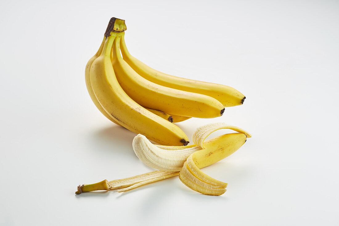 Bananas on a white surface