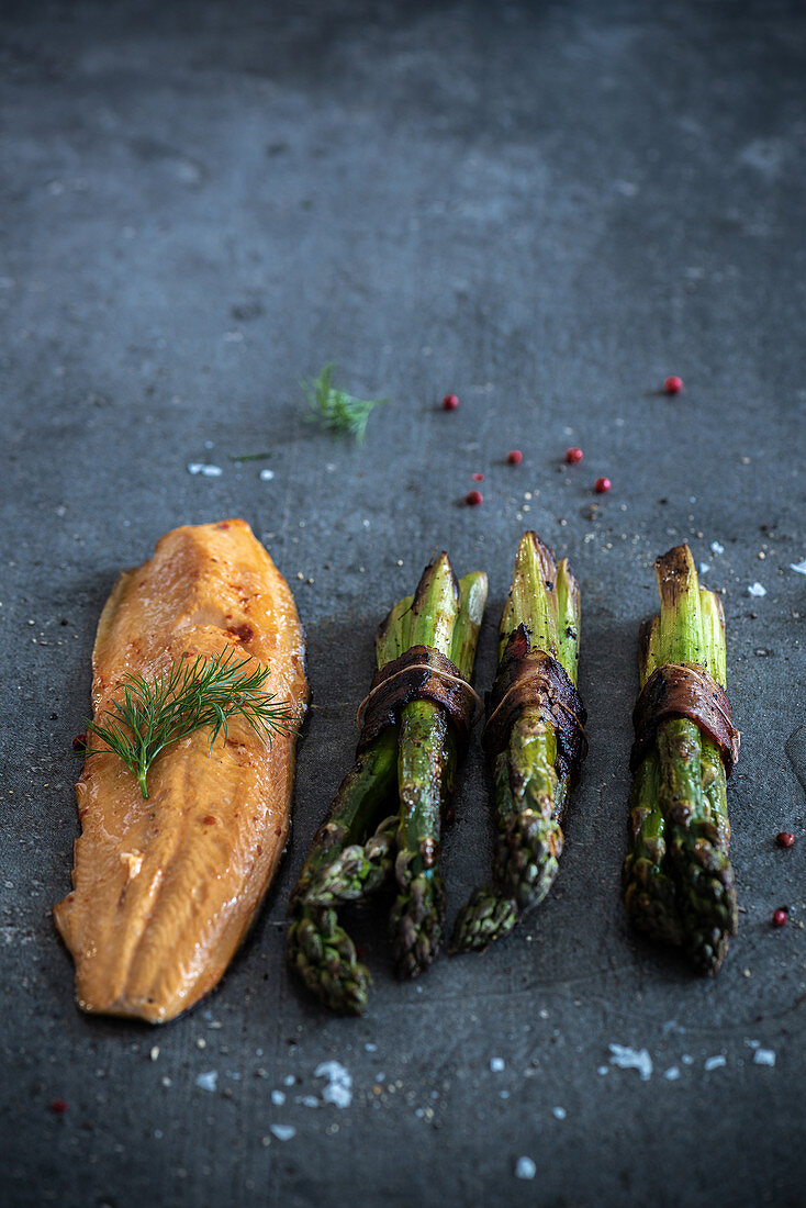 Brook trout with green asparagus, dill, pink pepper and sea salt