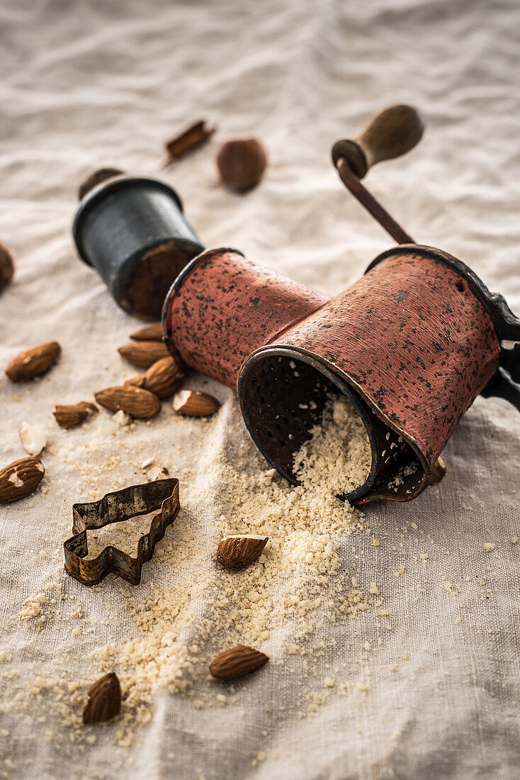 An old almond mill with whole and ground almonds