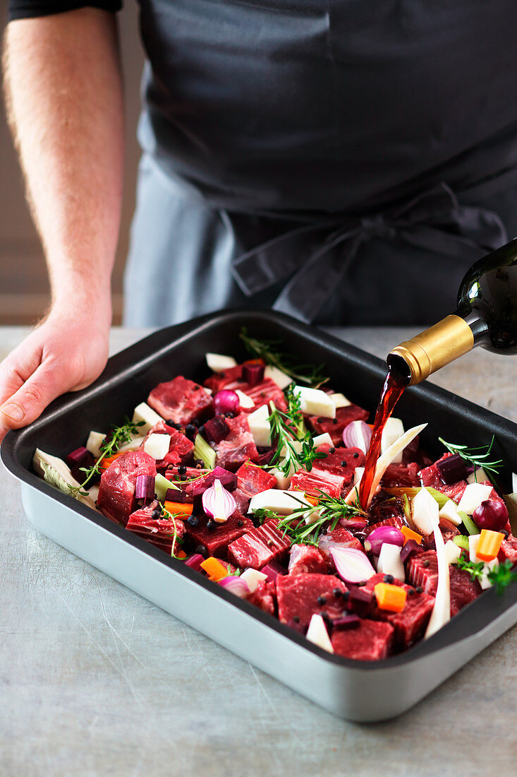 Beef being marinated for boeuf bourguignon