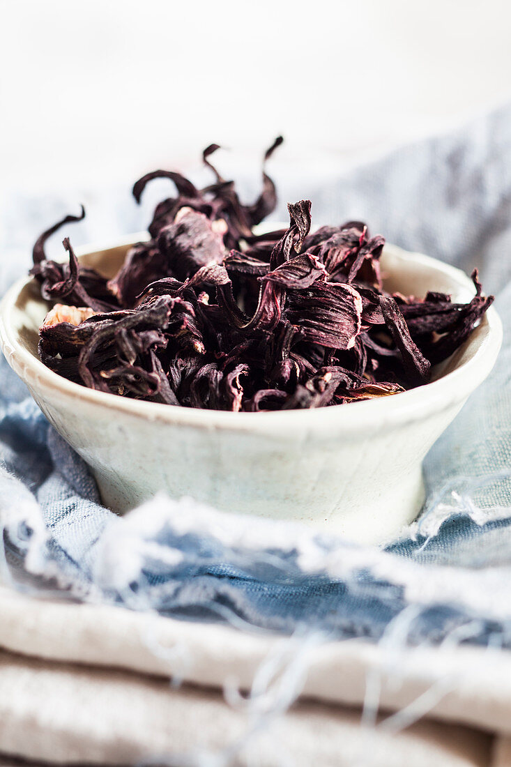 A bowl of hibiscus flower tea