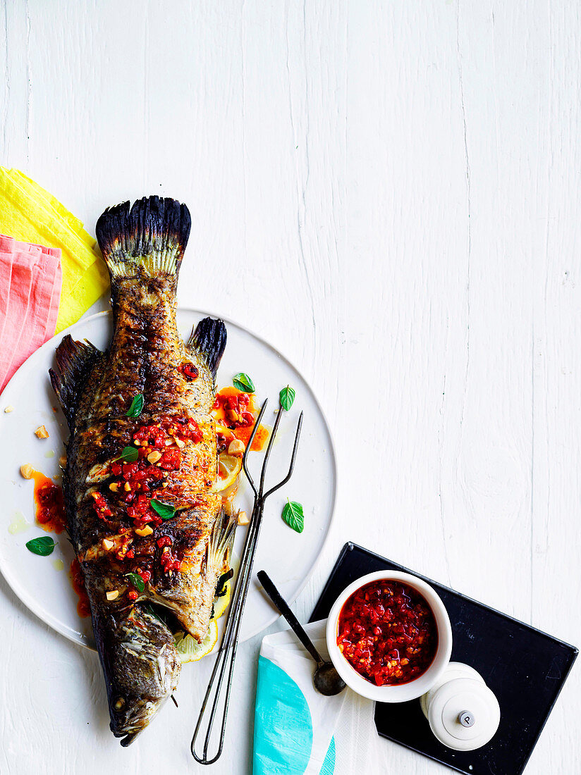 Barbecued barramundi with macadamia romesco