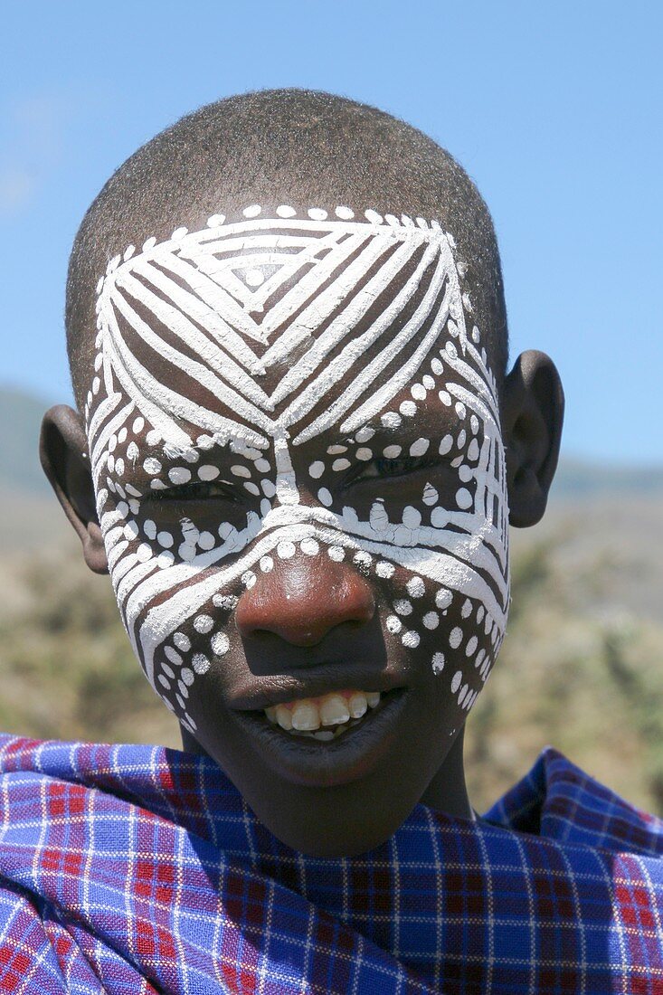 Maasai boy with painted face