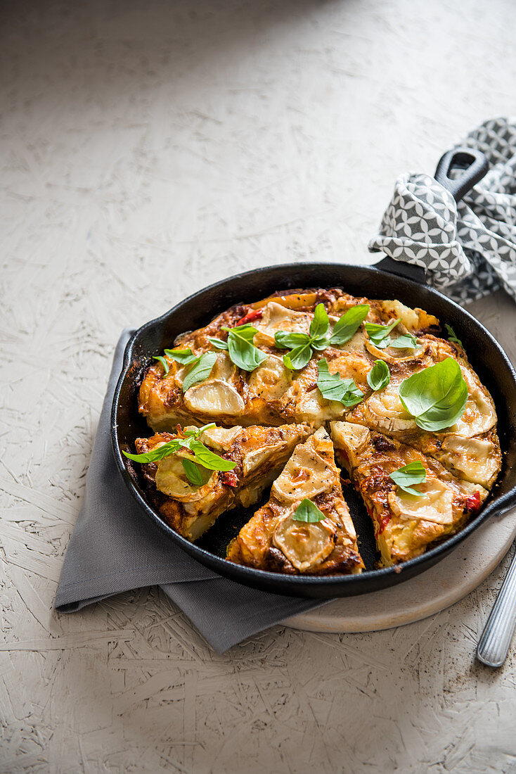 Spanish potato tortilla with red peppers and goat's cheese