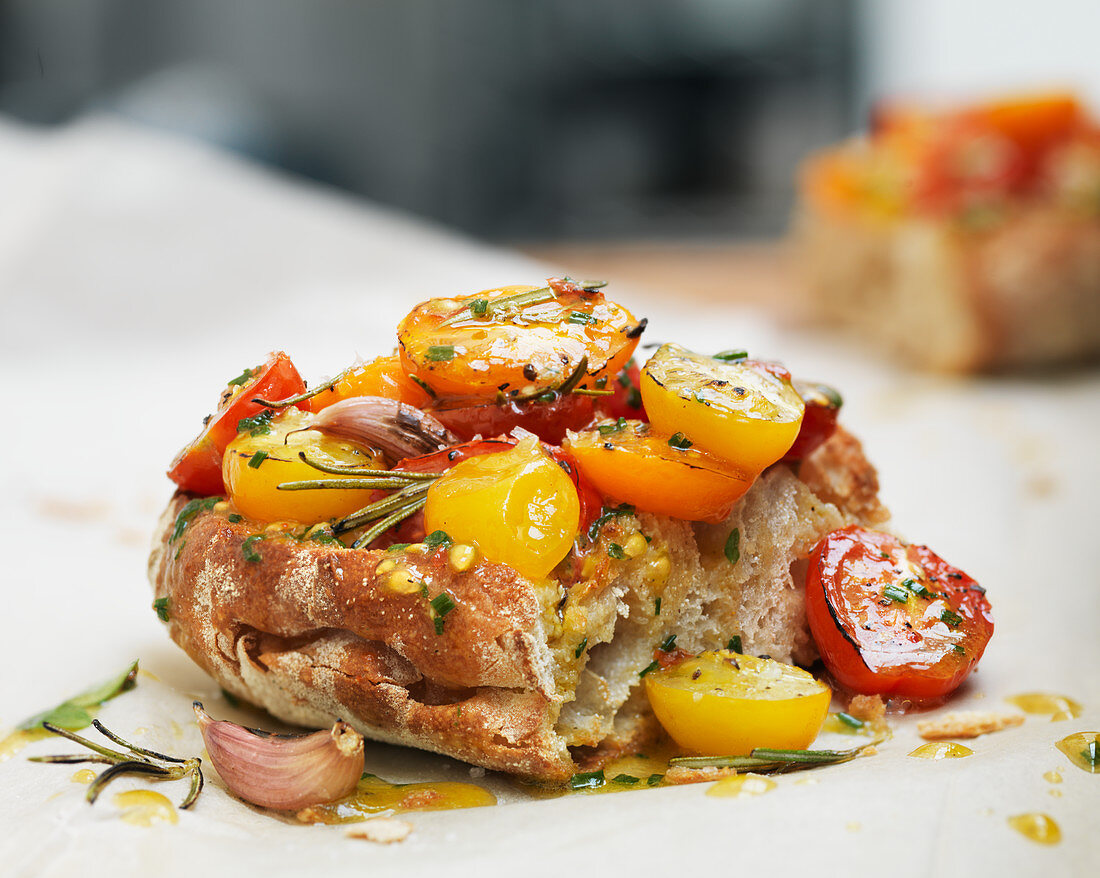 Ciabatta with grilled cherry tomatoes, garlic and rosemary