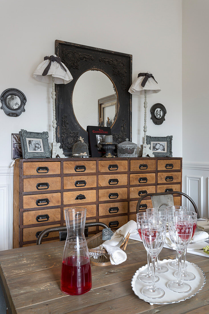 Rustic dining table and chest of drawers in dining area