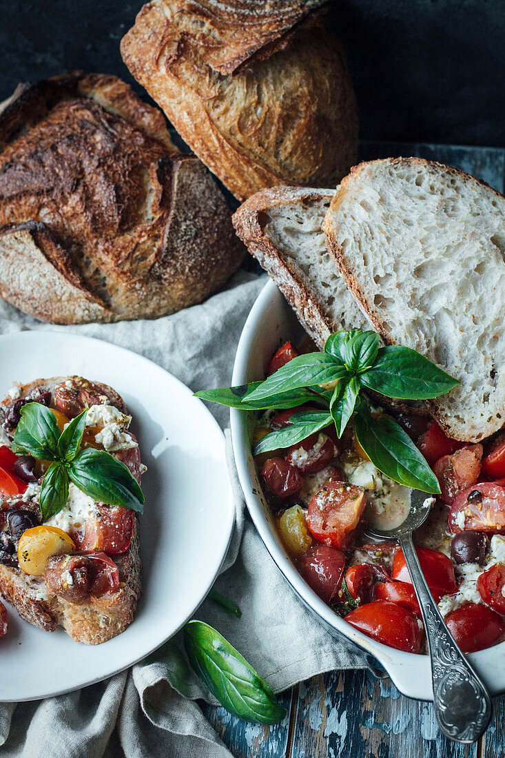 Tomato salad with feta cheese, olives and basil