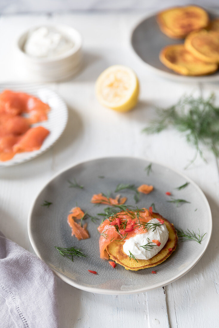 Corn cakes with smoked salmon, creme fraiche and dill