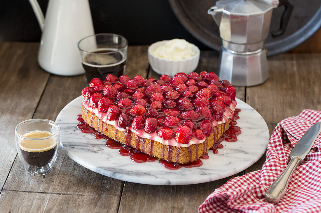 Heart-shaped strawberry cake with vanilla pudding