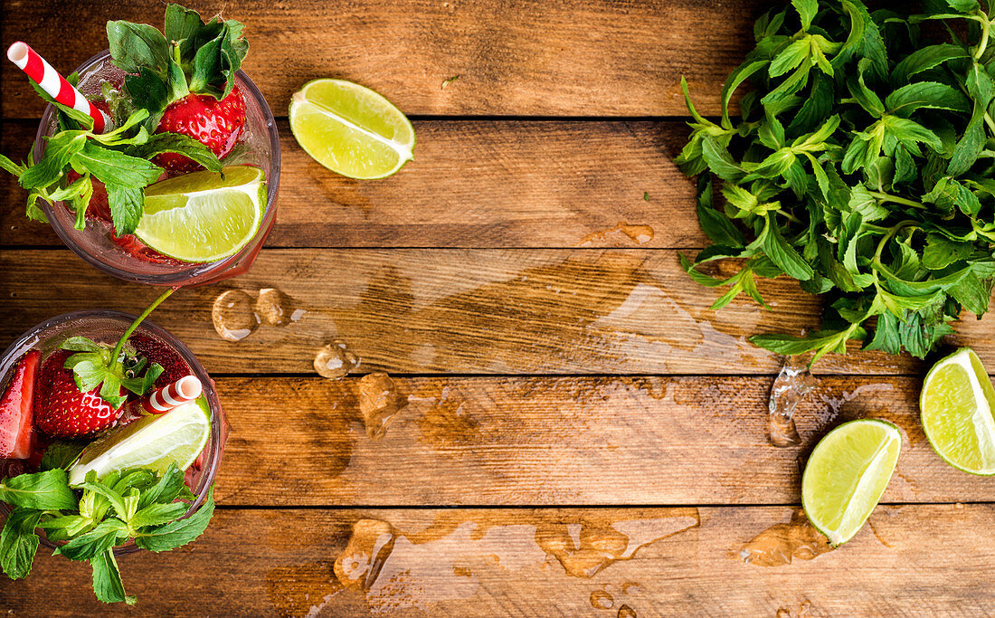 Strawberry mojito summer cocktails with mint and lime