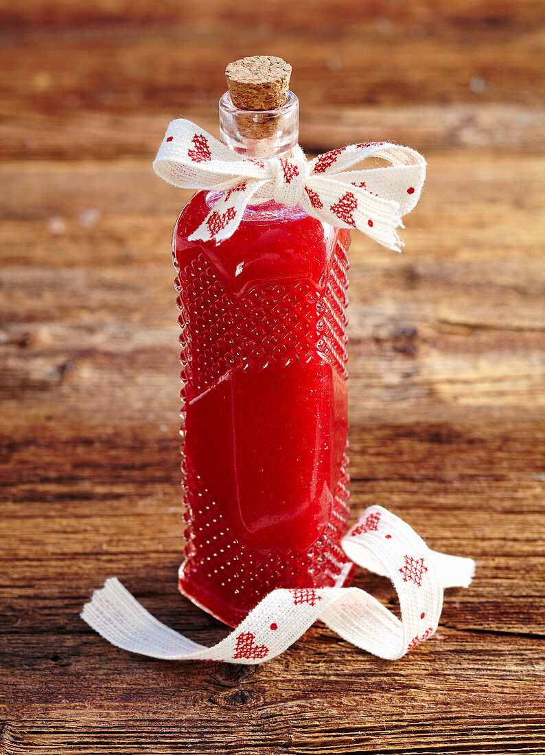 Homemade raspberry liqueur as a Christmas present