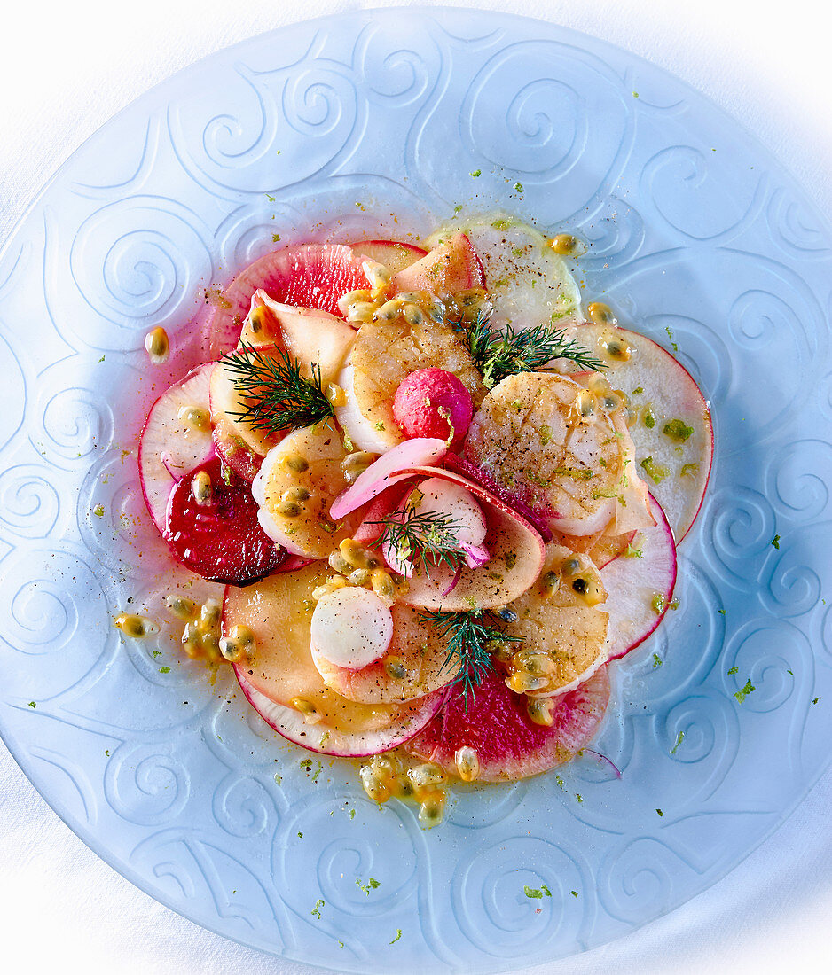 Scallops with radishes and passion fruit (seen from above)