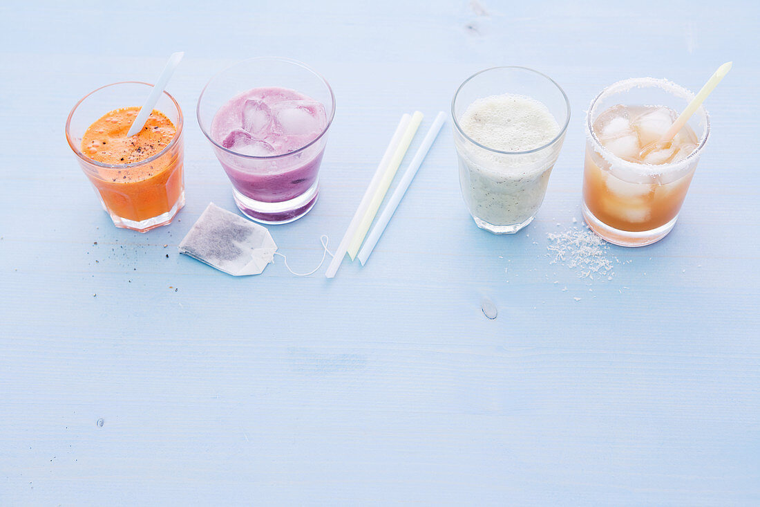 Savoury apple and pepper drink, exotic berry and peppermint punch, pear and kiwi spritzer, and mint lemonade