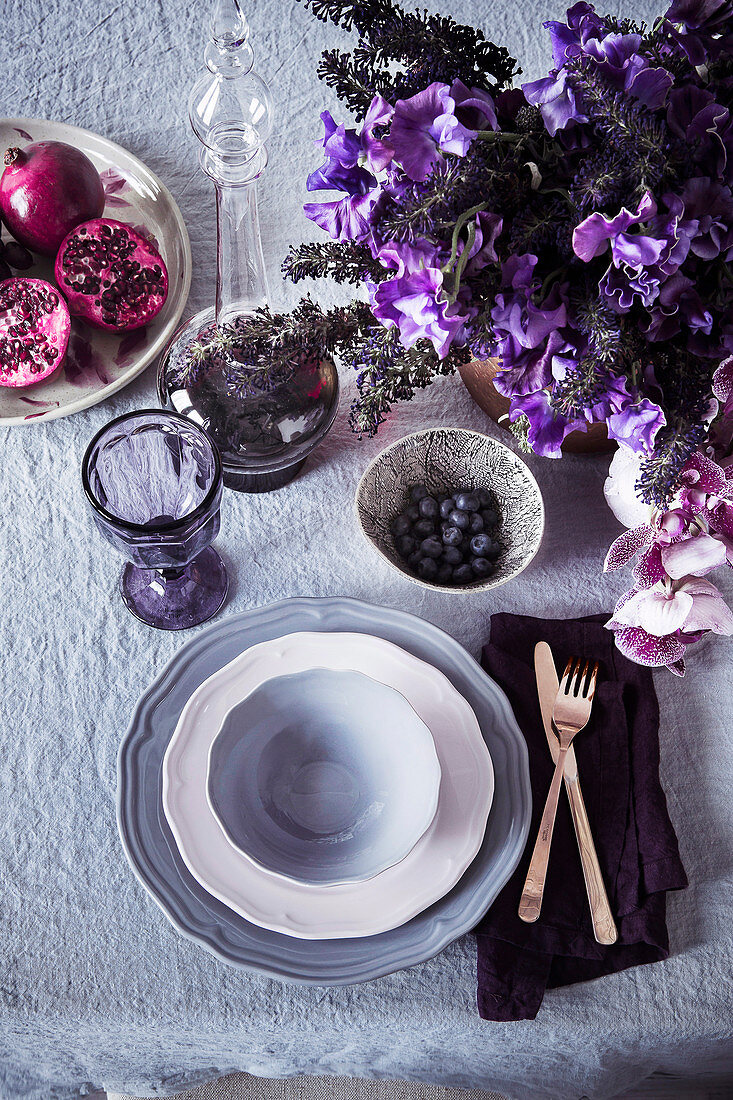 Laid table in purple and violet
