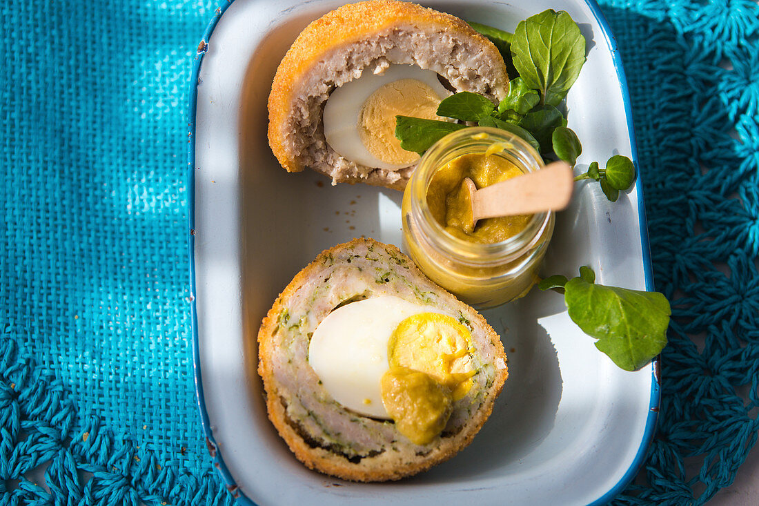 Scotch eggs with mustard