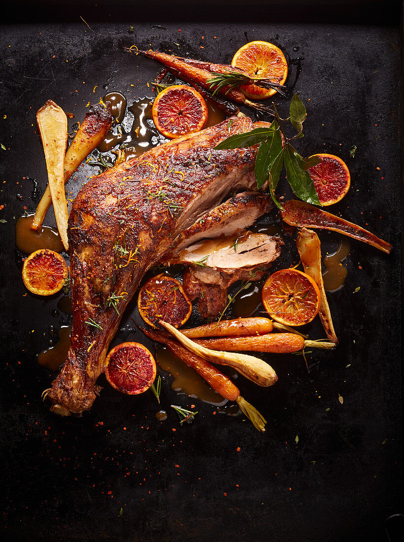 Oven roast turkey with carrots and blood oranges