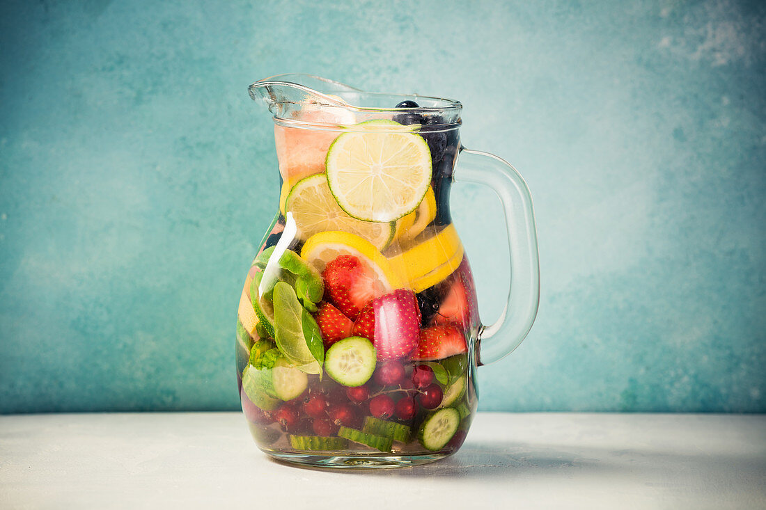 Infused water with fresh organic fruits and berries
