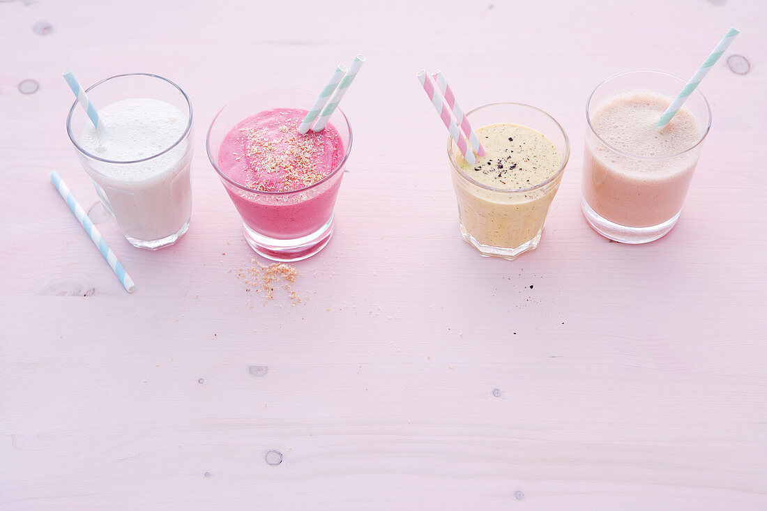Grape and almond drink; raspberry and coconut flip; melon and cucumber drink, and papaya and walnut drink