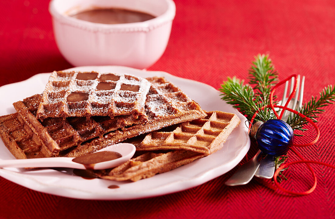 Chocolate waffles with chocolate sauce for Christmas
