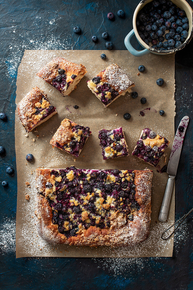 Sweet yeast dough tray bake with blueberries and crumble topping
