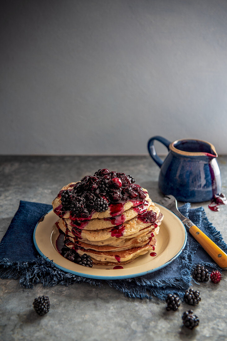 Buttermilk pancakes with blueberry and blackberry sauce