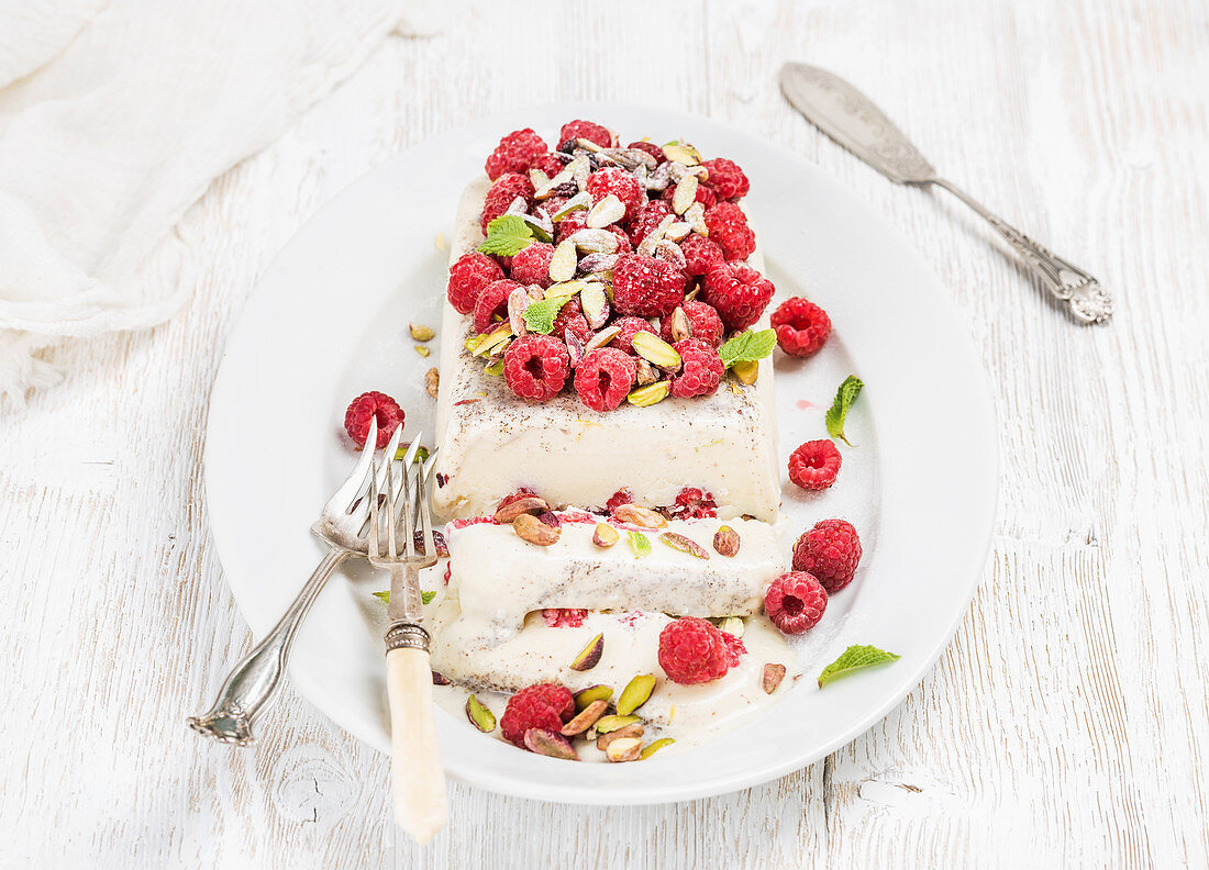 Homemade semifreddo with pistachio and raspberry