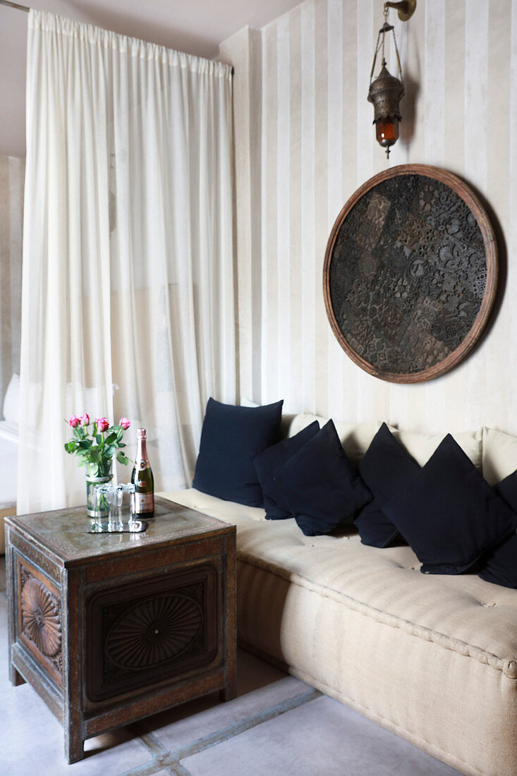 Oriental seating area in bedroom in shades of Champagne