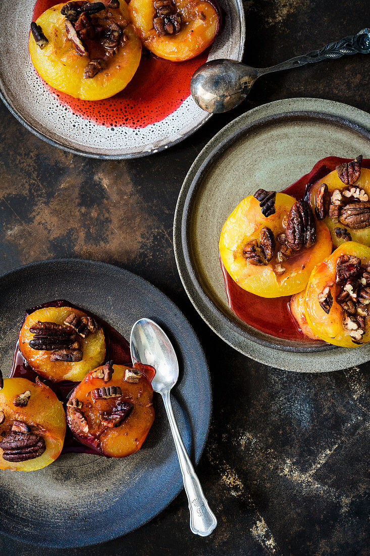 Caramelised plums with pecan nuts