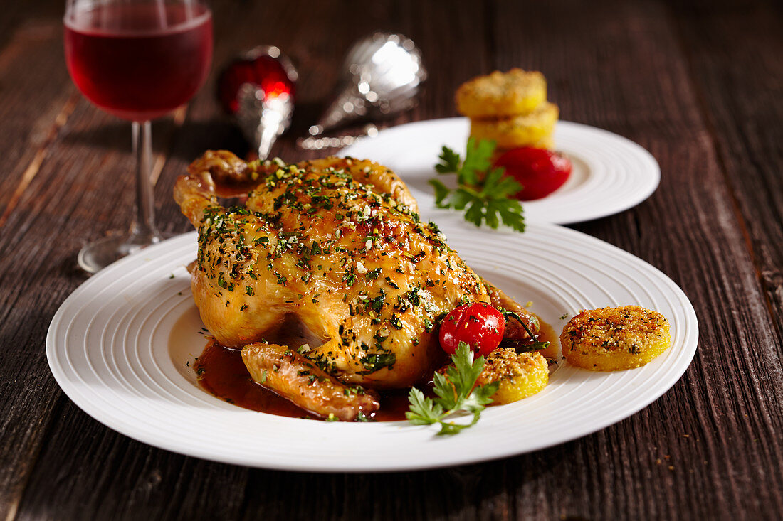Roasted spring chicken with lemon and polenta fritters