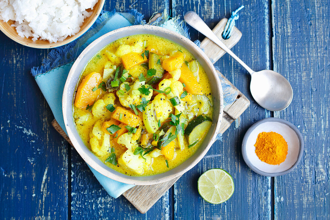 Cauliflower, pumpikn and courgette curry with coconut milk, vegan