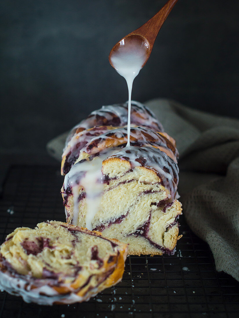 Yeast dough cake with blueberries and lemon glaze