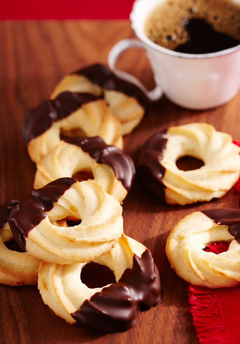 Shortbread piped orange biscuits with chocolate glaze for Christmas