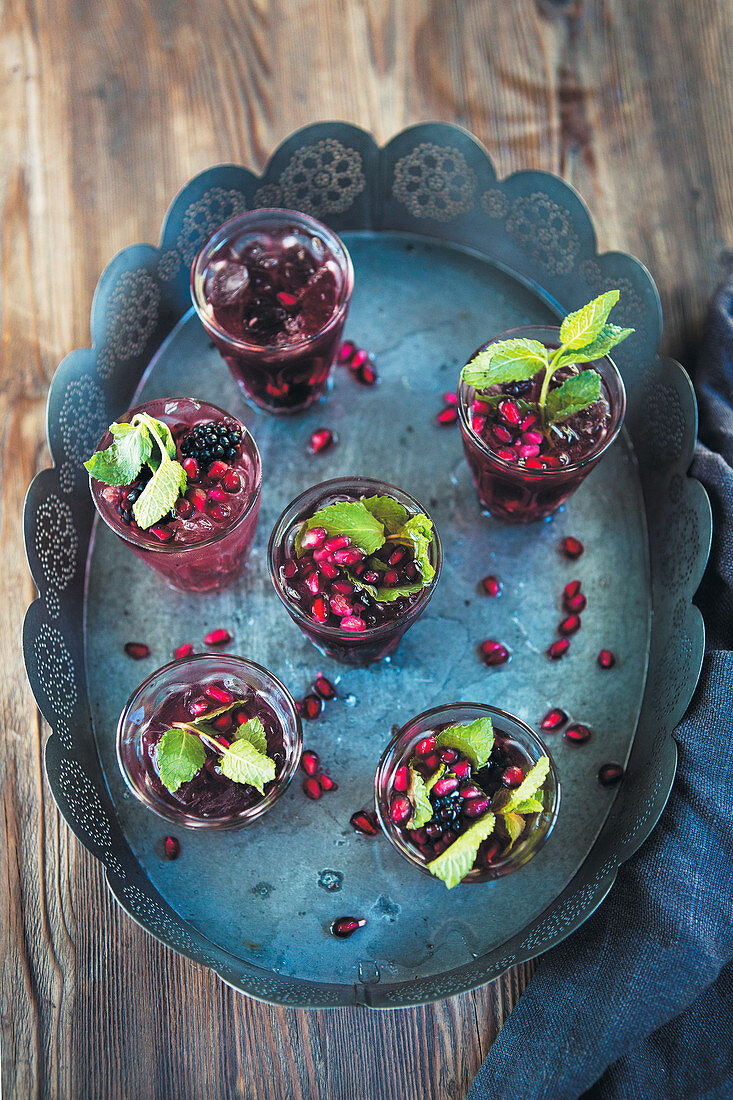 Berry and rosemary sangria with fresh mint
