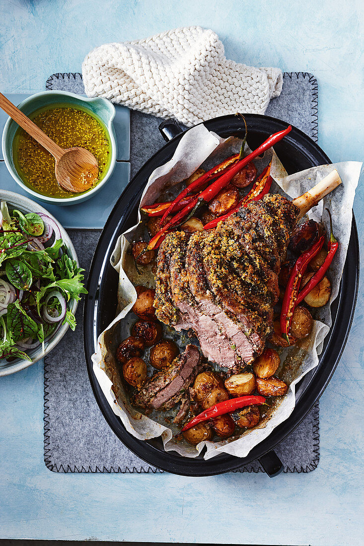 Crunchy green olive, rosemary and orange roast lamb