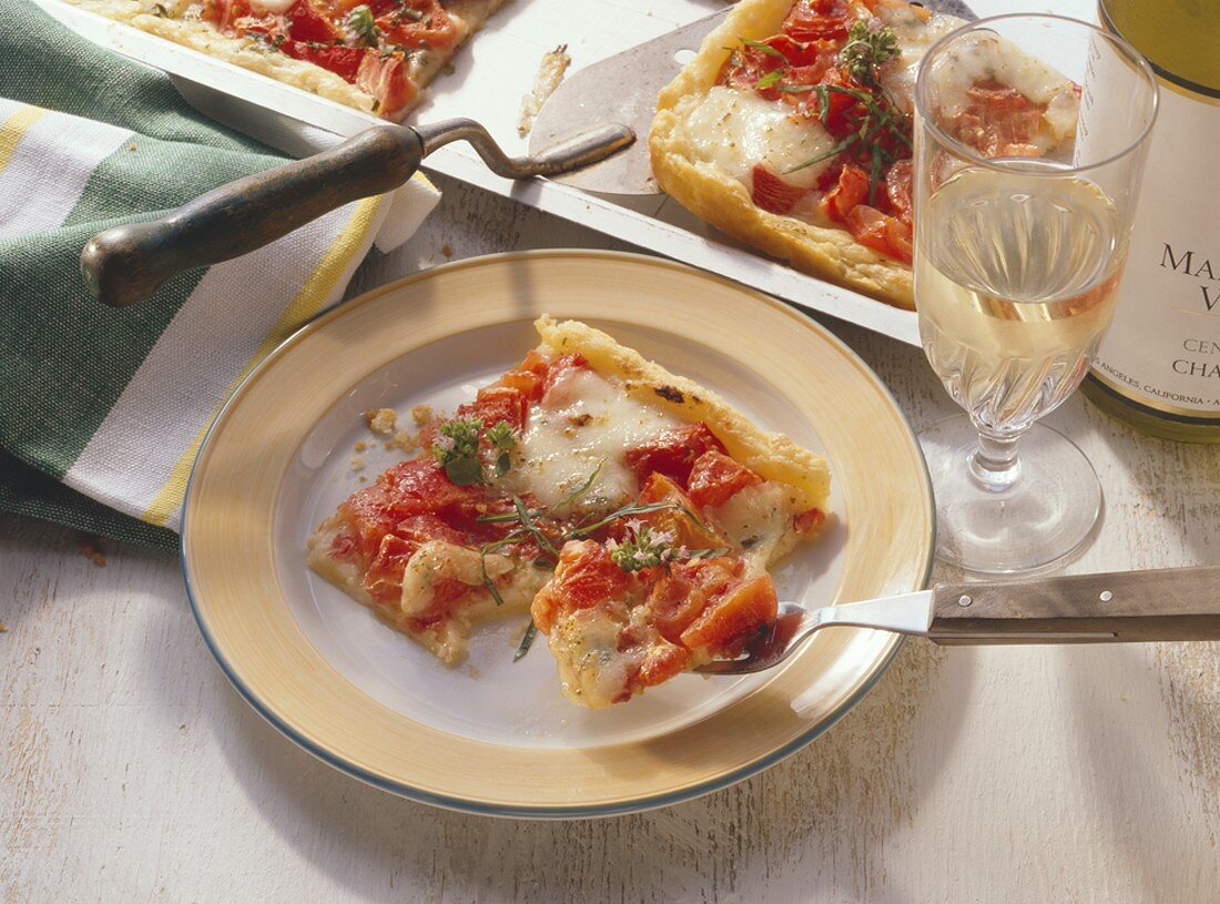 Tray-baked tart with tomatoes and cheese