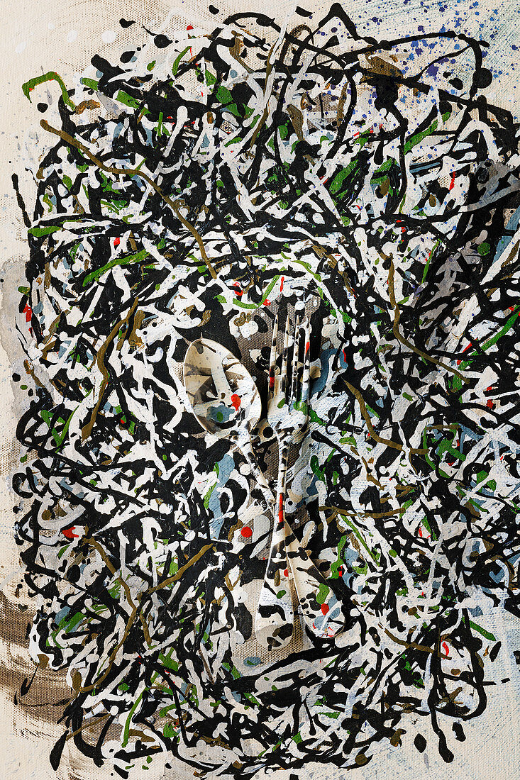 Food art: a spoon and a fork splattered with paint (inspired by Jackson Pollock)