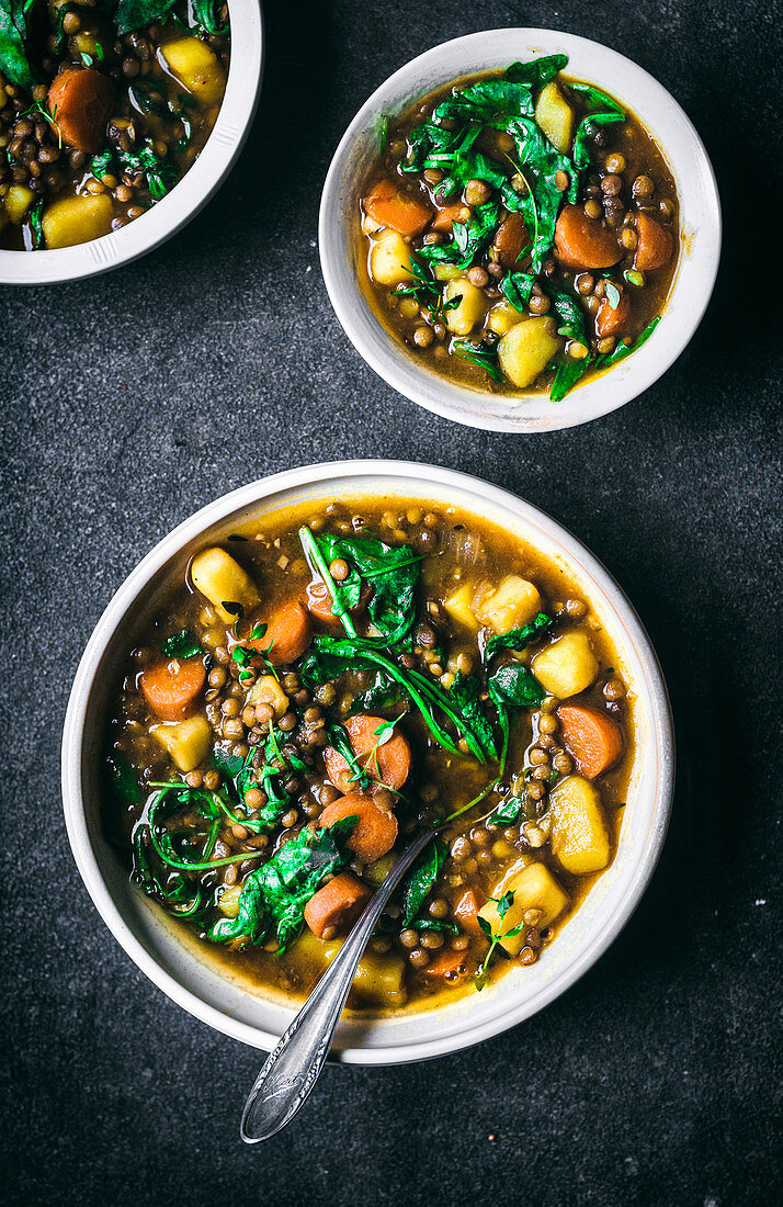 Carrot, potato, and lentil soup with greens