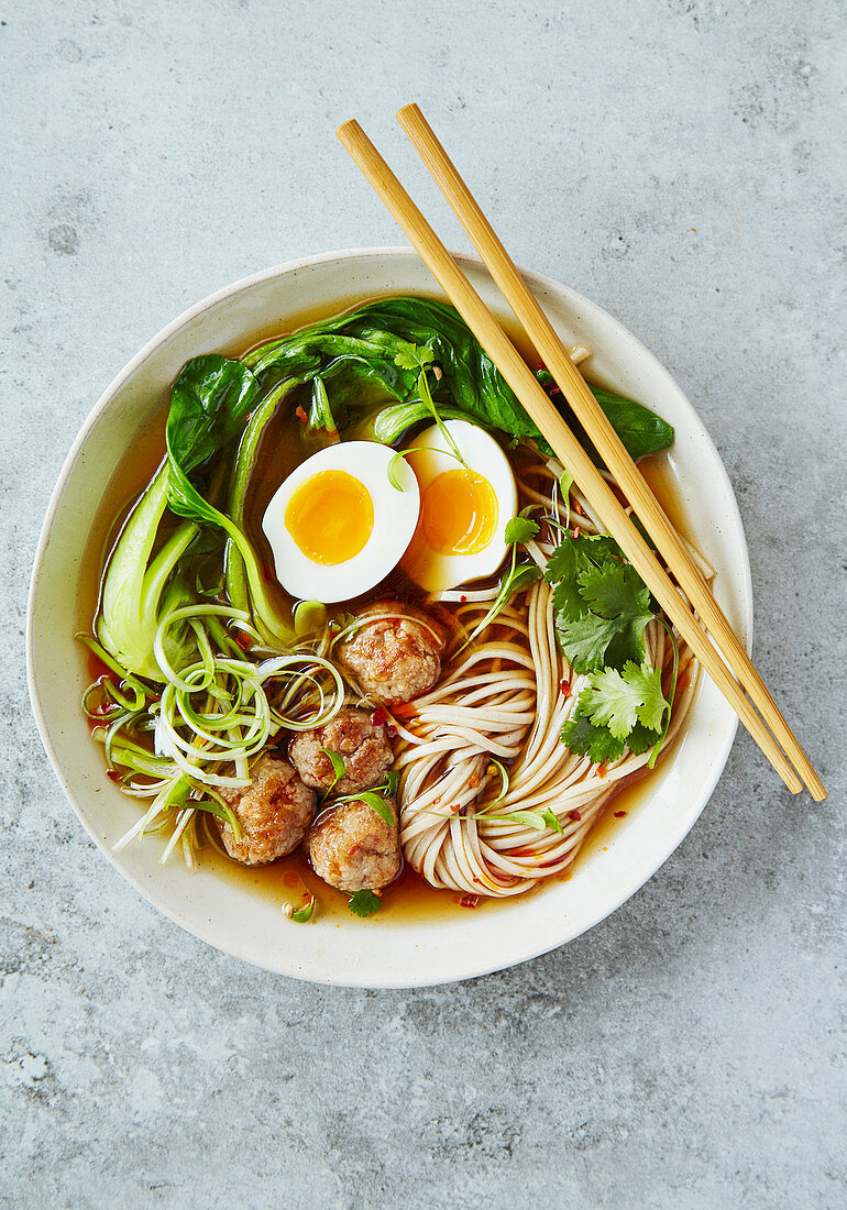 Asian Ramen noodles with egg and pak choi