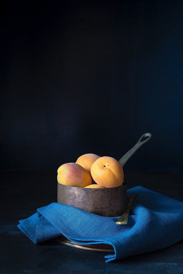 Apricots in a saucepan