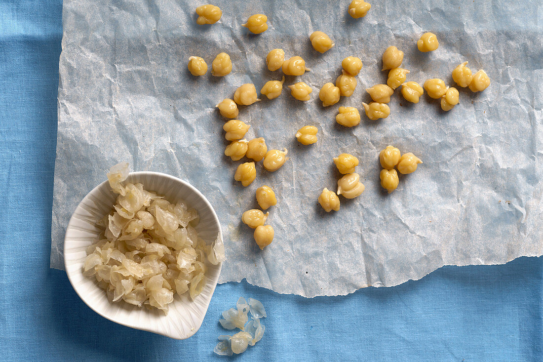 Peeling chickpeas for hummus preparation