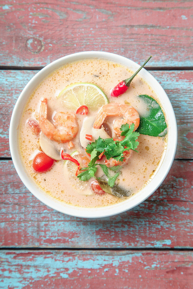 Traditional thai soup tom yum with shrimps and mushrooms