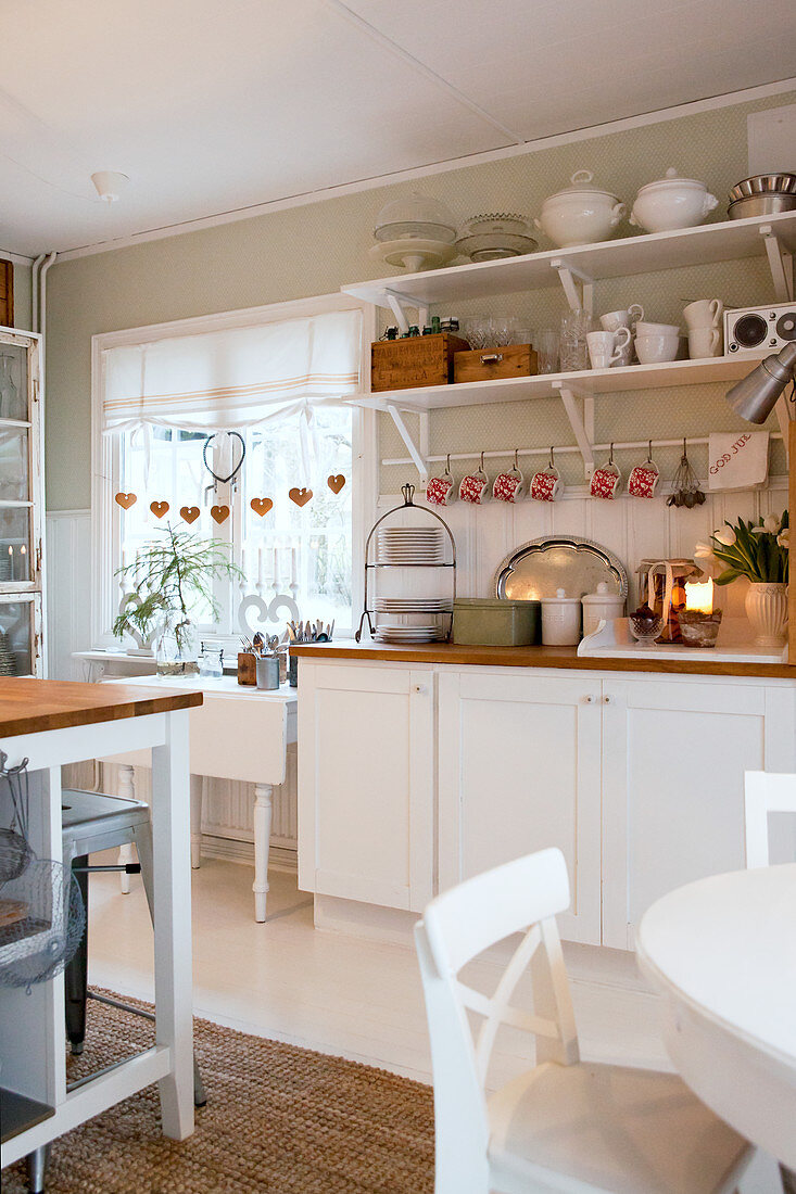 Christmas decorations in white, rustic kitchen