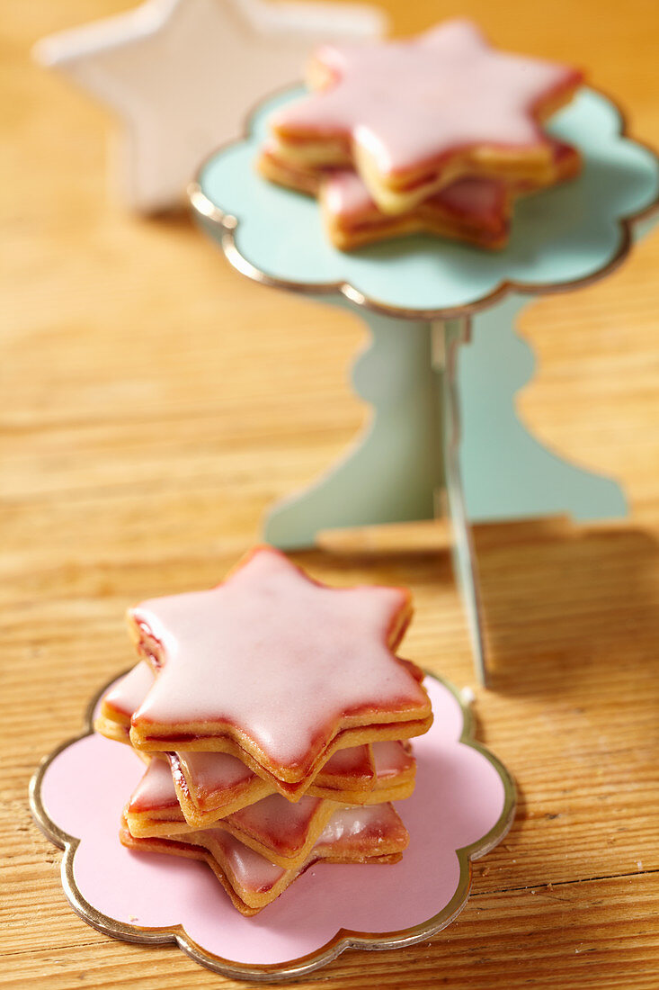 Shortbread star biscuits with raspberry jam and icing