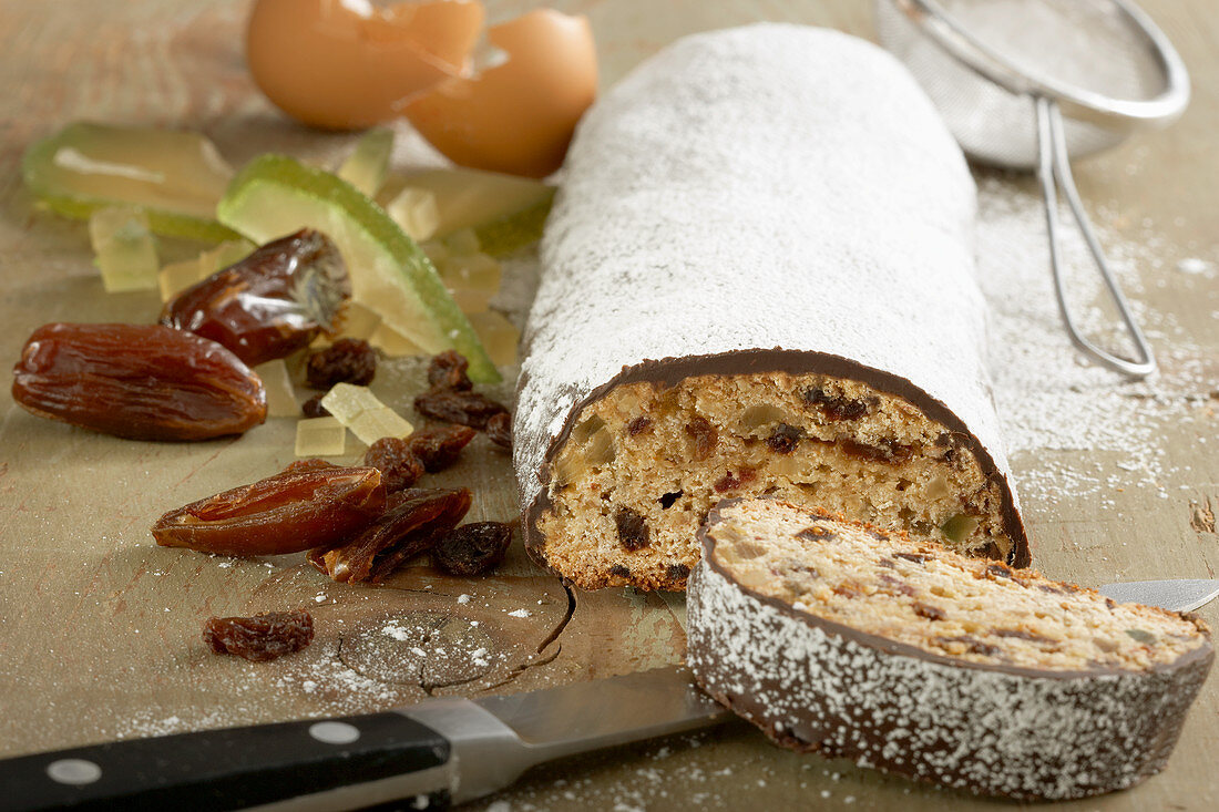 Viennesse fruit cake with honey, dried fruit, apricot jam and chocolate couverture