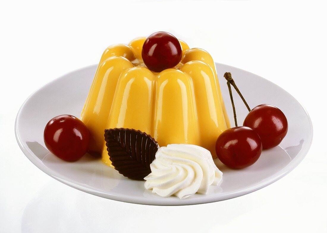 Vanilla pudding with whipped cream & cherries