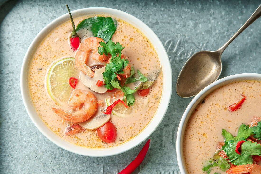 Traditional thai soup 'Tom yum' with shrimps and mushrooms