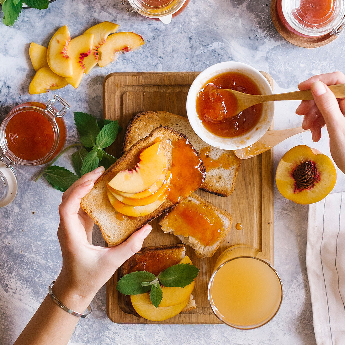 Tasty breakfast - Toasts of bread with apricot jam and fresh fruits