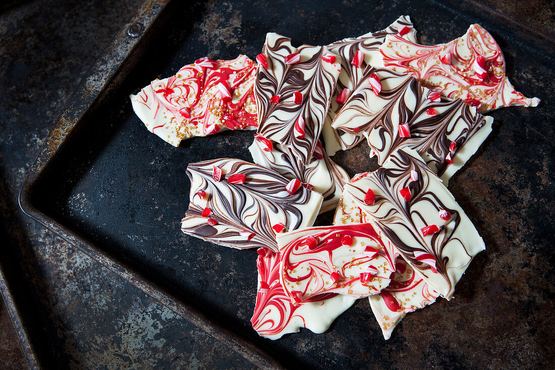 Marbled chocolate bark sprinkled with candy cane pieces